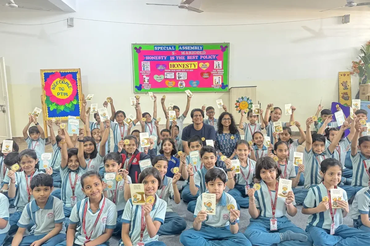 Children holding up Kabir's doha cards during a Kabir for Kids interactive session at Jain Bharati Mrigavati Vidyalaya, Delhi