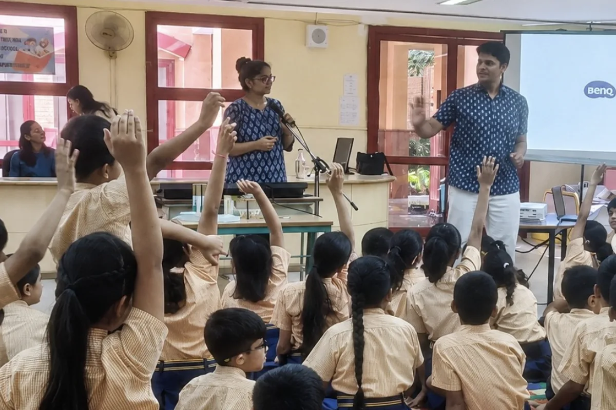 Children raising their hands during a Kabir for Kids school workshop at Sanskriti School, Delhi, May 2026